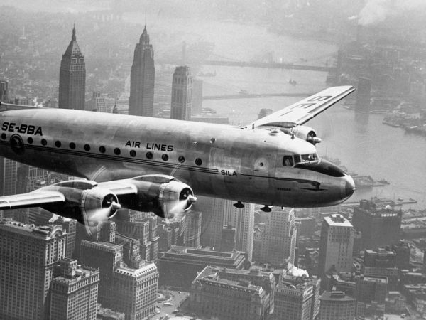 Aircraft Flying over City 1946