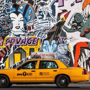 Taxi and mural painting in Soho, NYC