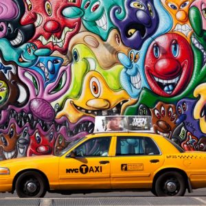 Taxi and mural painting in Soho, NYC