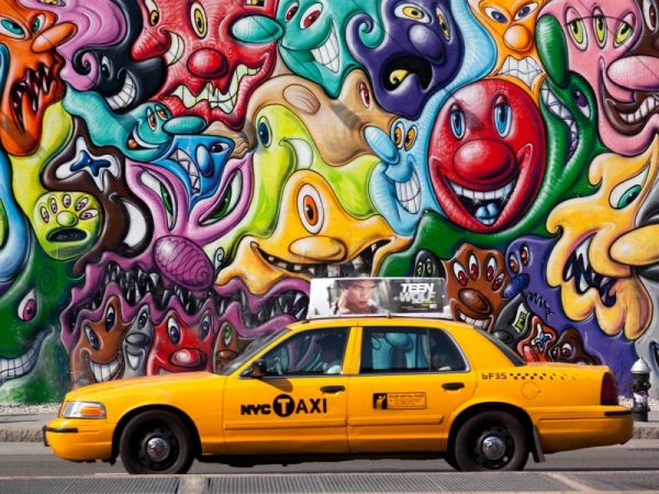 Taxi and mural painting in Soho, NYC