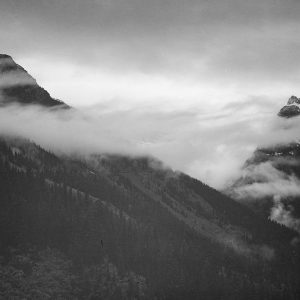 Mountain partially covered with clouds-Glacier National Park-Montana